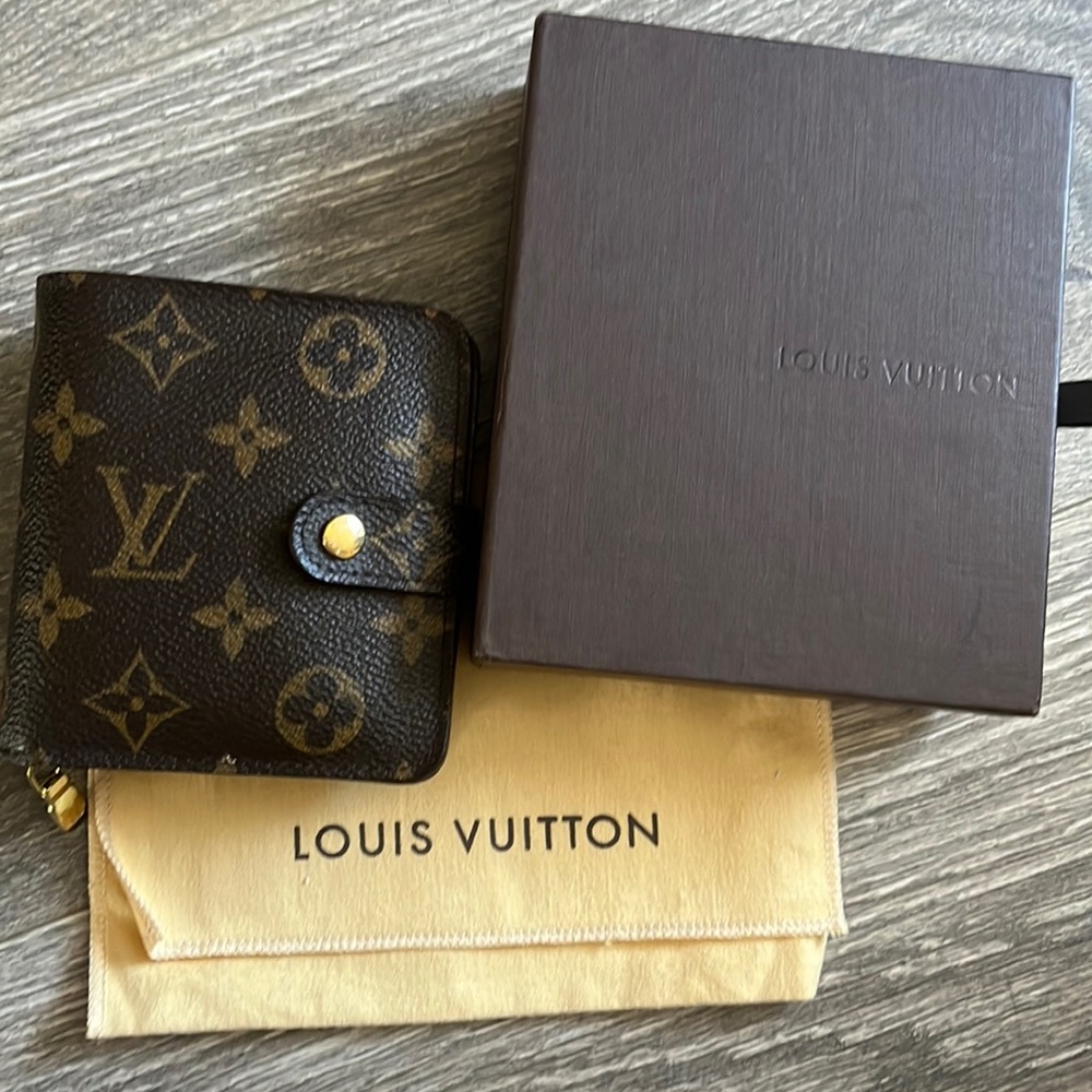 Louis Vuitton compact wallet.